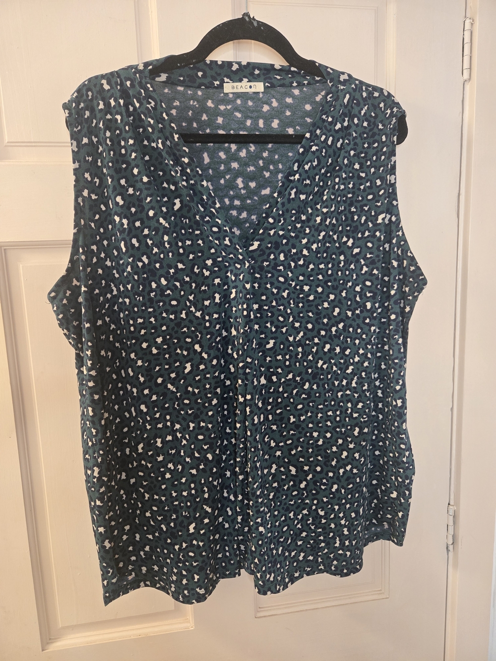 Beacon Teal and White Sleeveless V-Neck Printed Blouse